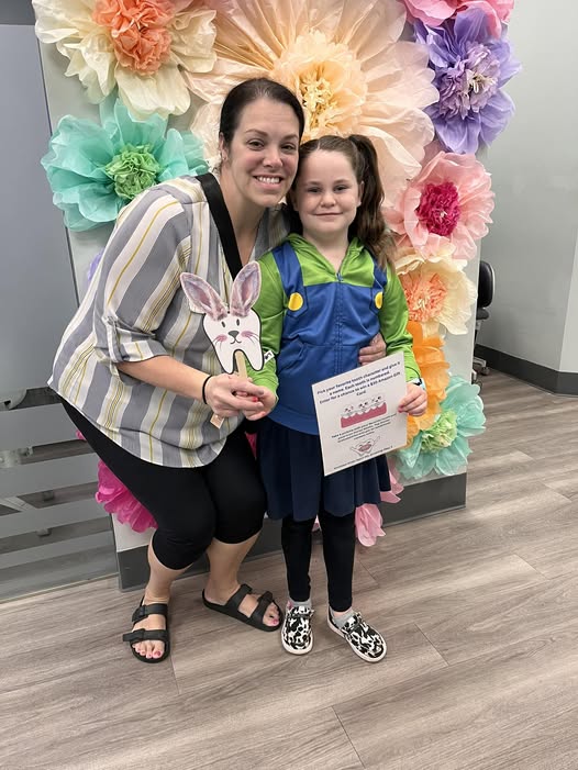 Stellar Orthodontics young patient with parent at a Delaware office